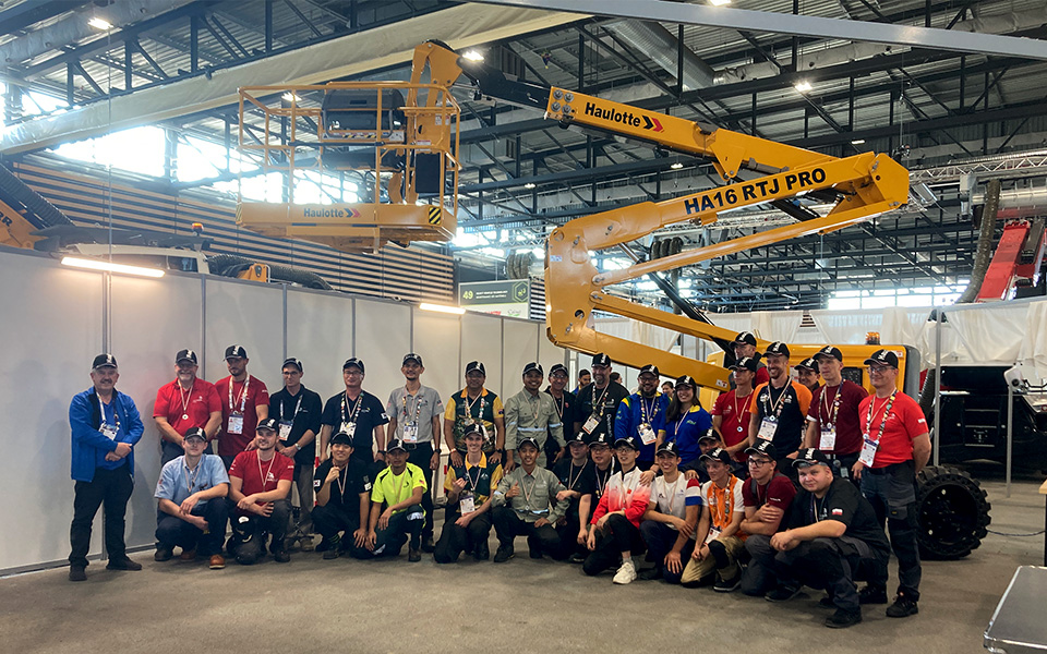 Johan Beillevaire with the Haulotte Group team after winning the silver medal at WorldSkills 2024 in equipment maintenance.