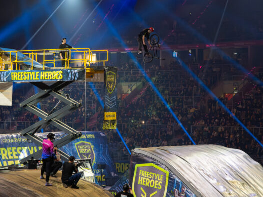 Haulotte electric scissor lift deployed by Ramirent Poland at Freestyle Heroes motocross event.